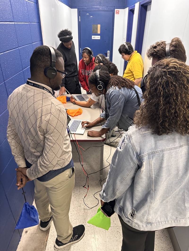 Students participate from the auditorium during BUILD IT UP Live.
