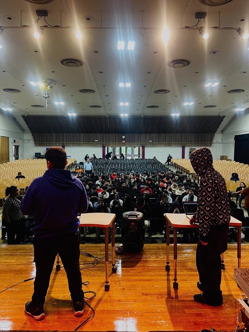 Students face off in a friendly live beat battle.