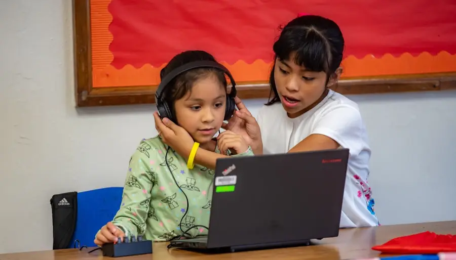 LTBB mentors and students connect through hands-on music learning.