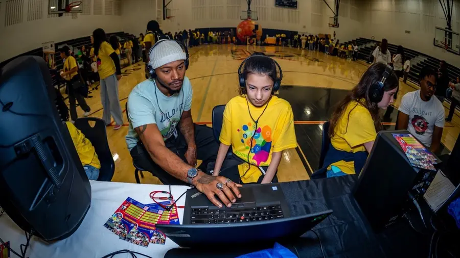 Middle school students build technical music production skills.