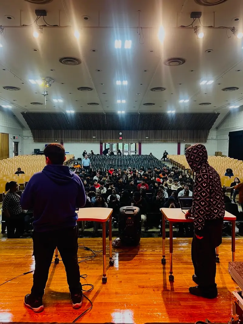 Students face off in a friendly live beat battle.